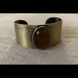Beautiful cuff bracelet with a centered crystal